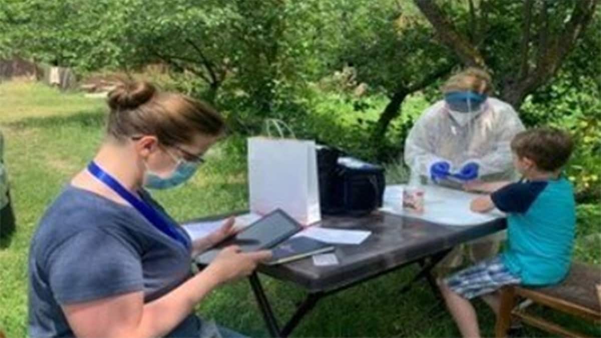 CDC workers conducting field work outdoors in Georgia.