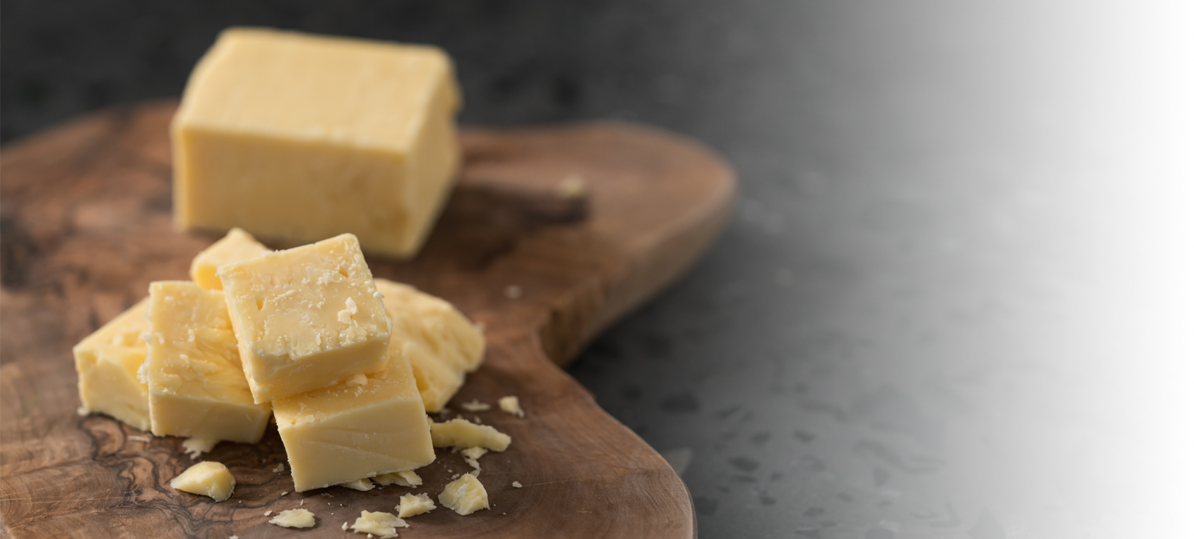 cheddar cheese on cheese board