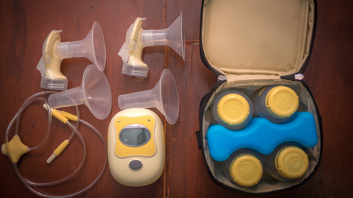 Portable breast pump and bottles