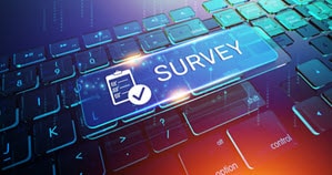 Graphic depicting a keyboard and a highlighted button called survey