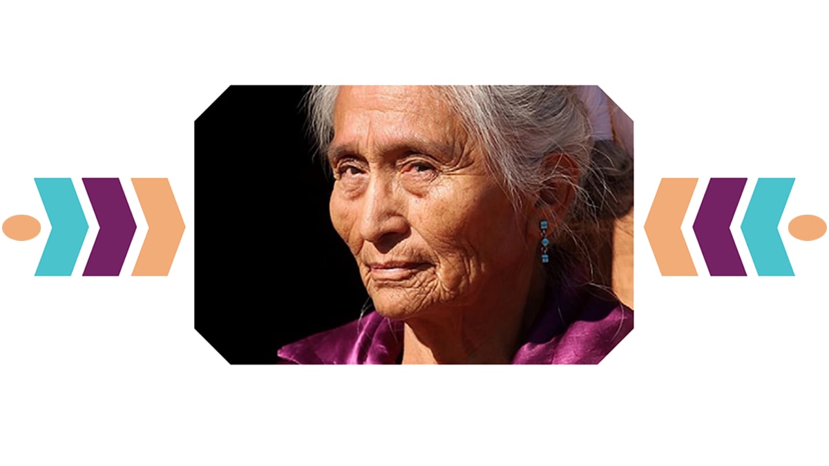 Profile of tribal woman looking into the distance with decorative shapes on either side.