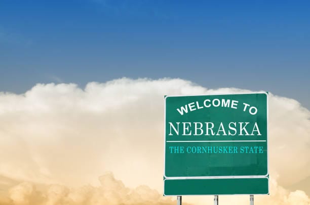 Sign saying Welcome to Nebraska, the Cornhusker State