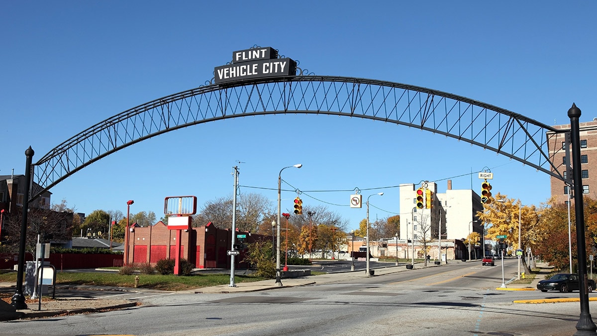 Flint Vehicle City sign entering downtown