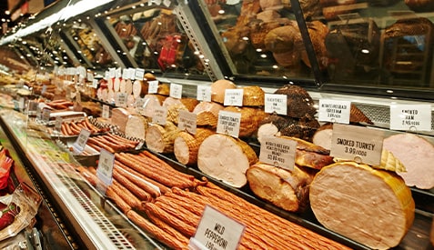 deli meats in a store display case