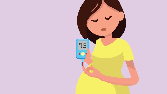 Pregnant woman checking blood sugar levels