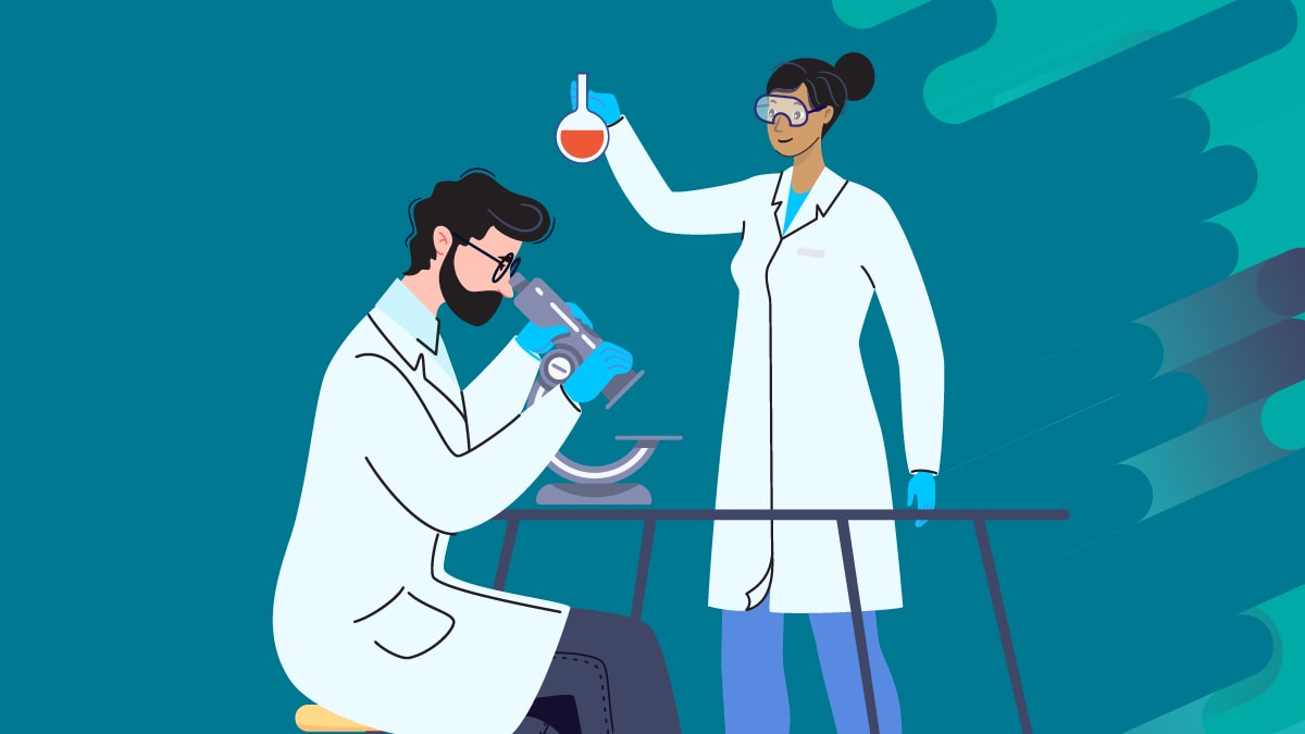 A male lab scientists looking through a microscope with a female lab scientist standing and holding up a sample