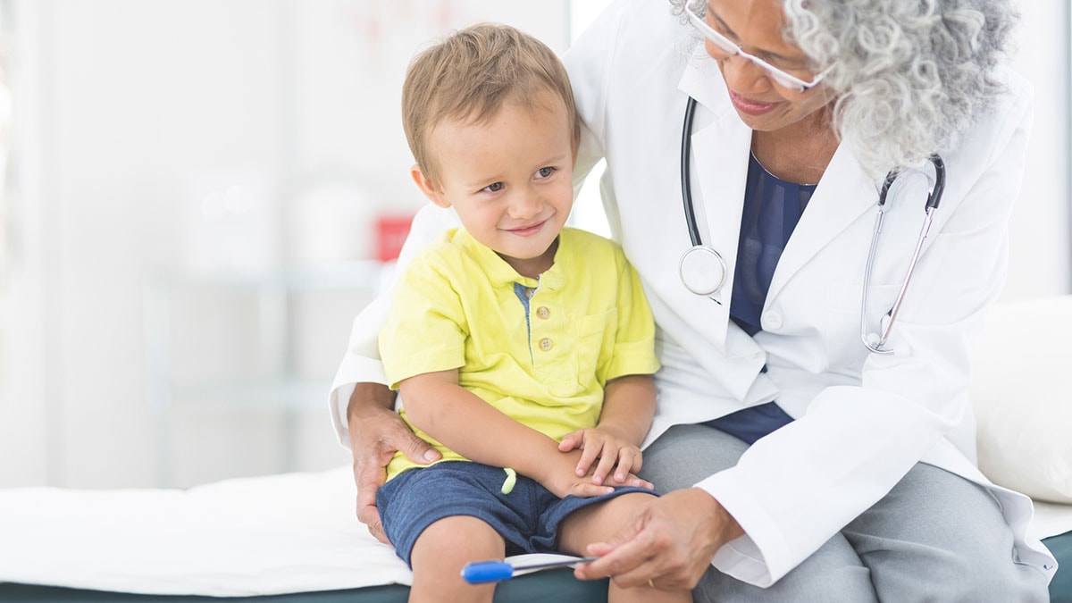 A young boy visits his doctor