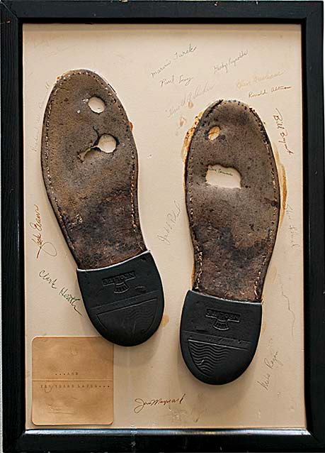 1960.png Worn out shoe leather with a prominent hole worn through was a recurring visual theme within the EIS.