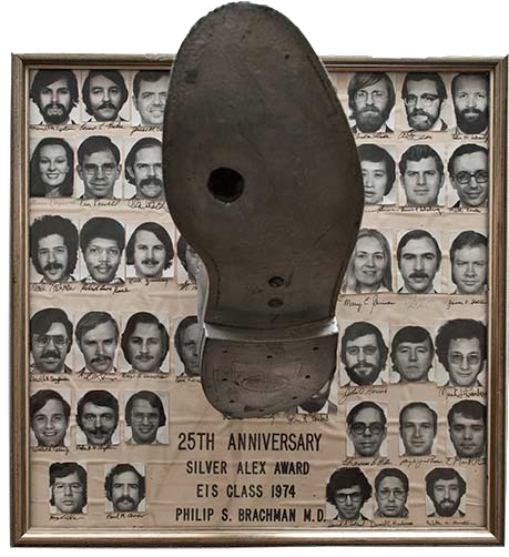 1974.png The group developed an award, called the “Silver Alex” in honor of Alex Langmuir, who founded the EIS. We got a collection of shoes, made sure each one had the trademark “shoe leather hole” on the sole, and painted them silver.