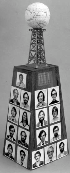 1976.png This plaque continued a tradition that each class presented the Epidemiology Director a humorous gift that could be displayed in his office.