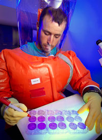 scientist-bsl4-suit-200px.jpg CDC scientist, Zach Braden, in BSL4 suit, 2013