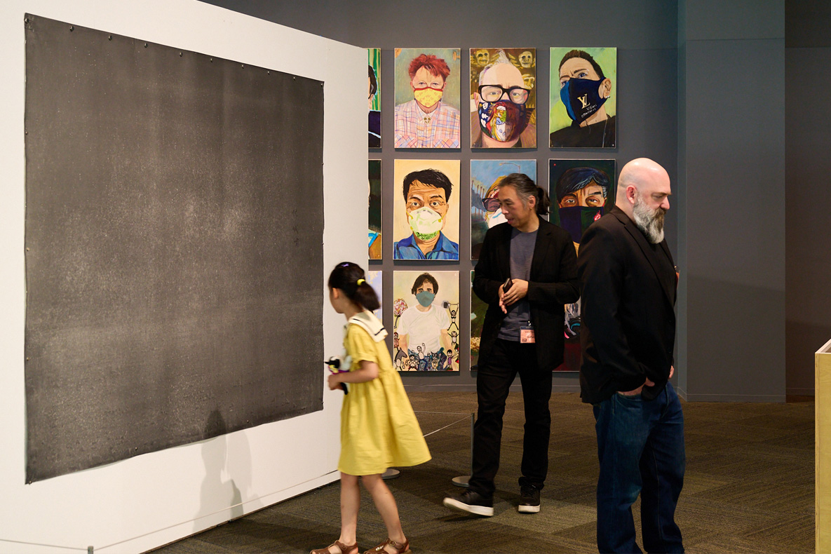 Group of people viewing an exhibit