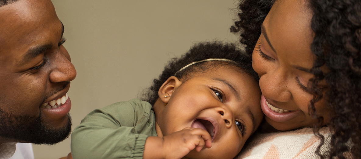Happy African American family with their little girl Happy African American family with their little girl.