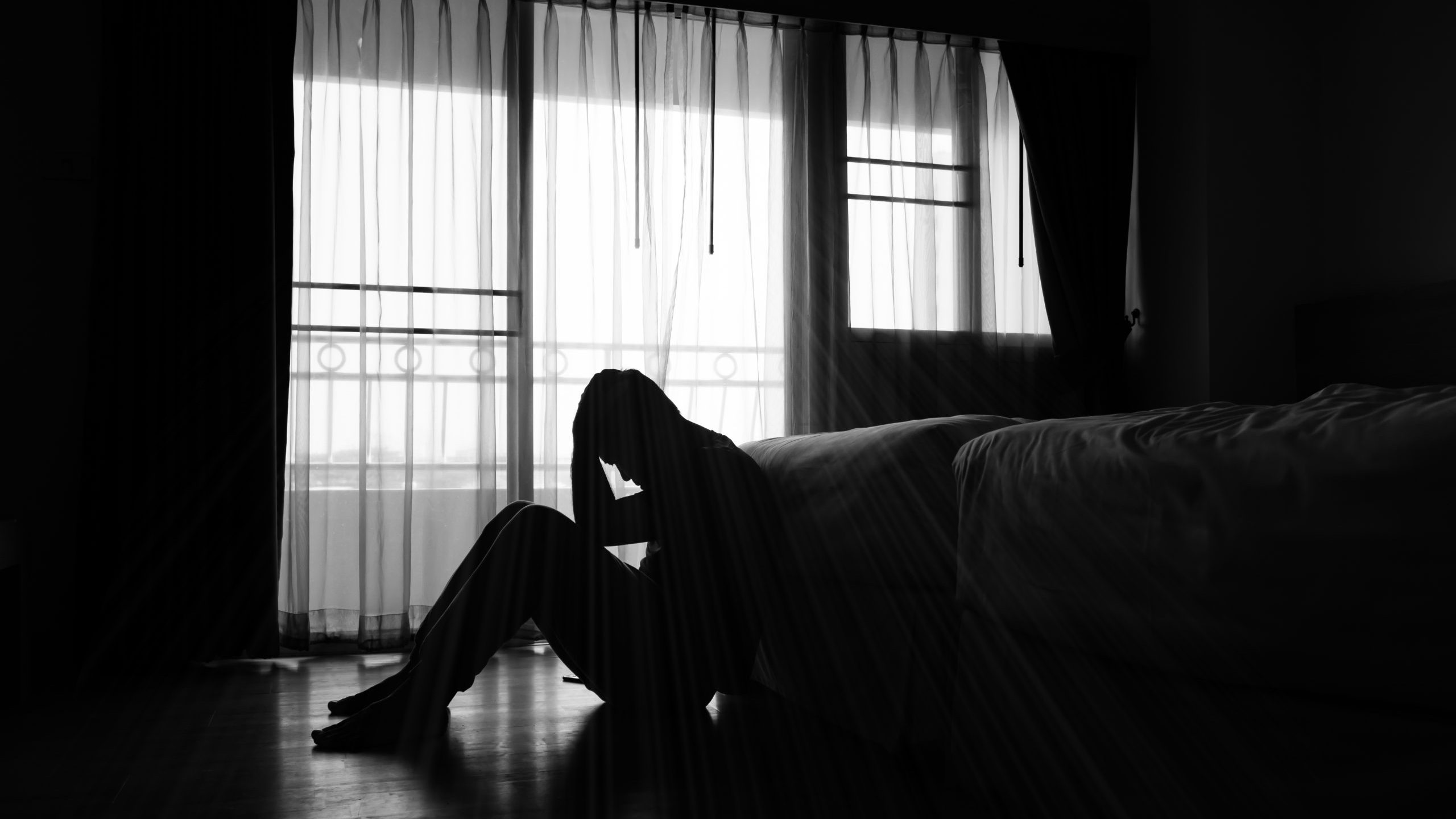 Man sitting alone in the dark