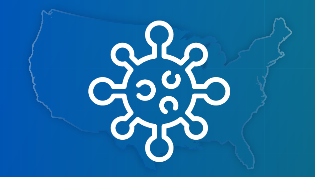 An outline of a COVID-19 virus against a U.S. map.