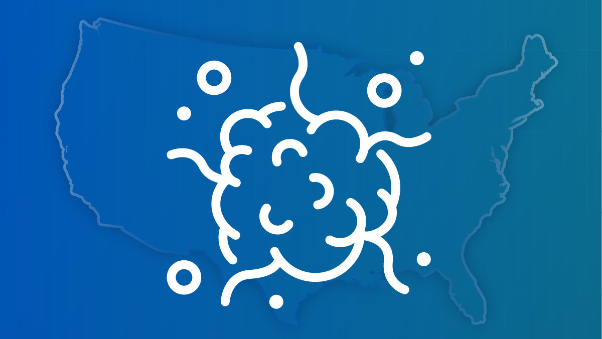 An outline of a cancer tumor  against a U.S. map.