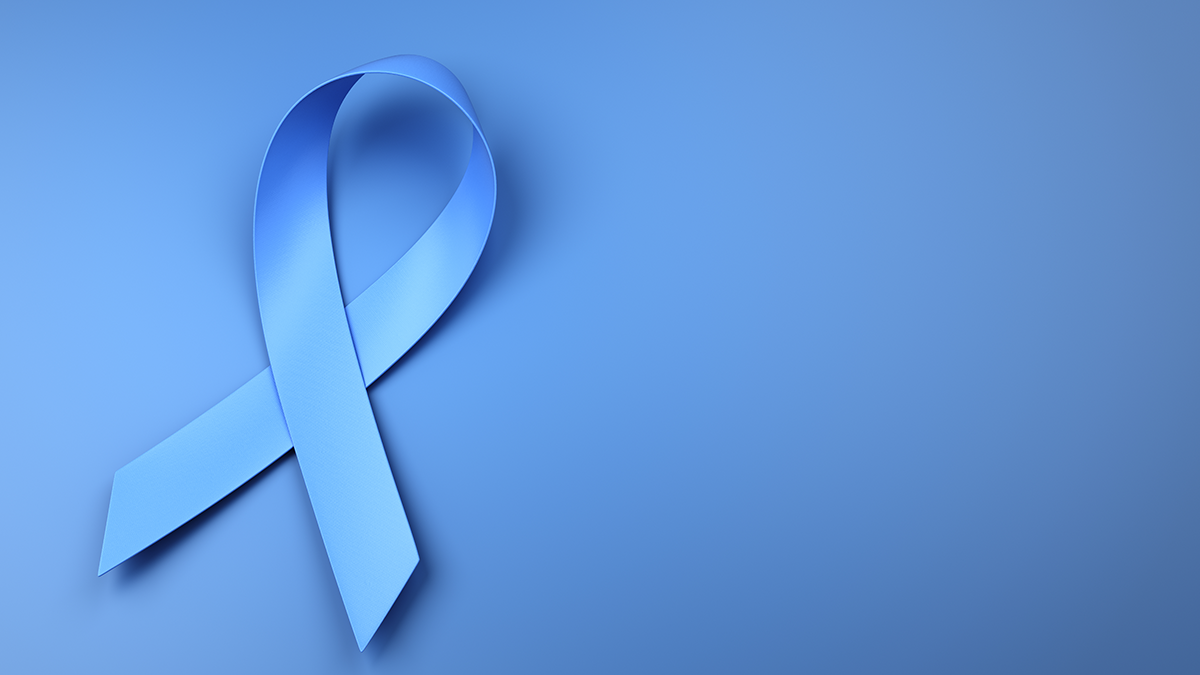 Blue colorectal cancer awareness ribbon on a blue background