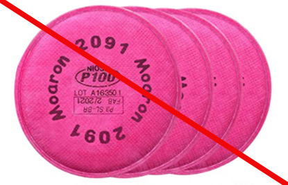 Layered stack of four filters that misrepresent a NIOSH approval