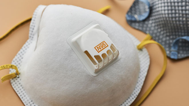 Close up image of an N95 filtering facepiece respirator