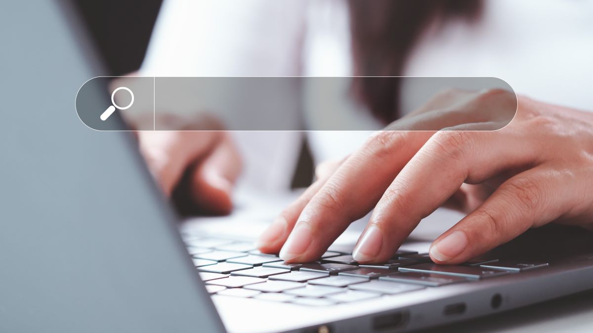 Individual searching computer with search bar overtop image