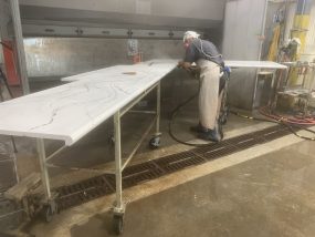 NIOSH researchers reduce the risk of silicosis and other lung diseases for workers fabricating stone countertops by evaluating engineering control measures such as optimized ventilation through dust extractors, and providing recommendations to partners including OSHA, state agencies, industrial partners, and labor unions.