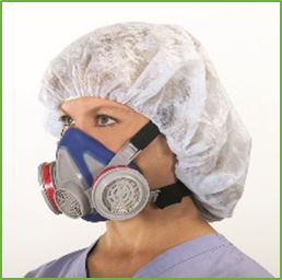 Healthcare worker wearing an elastomeric respirator
