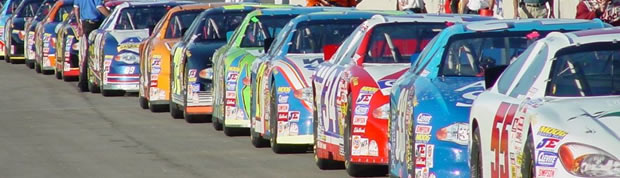 photo of racing cars lined up