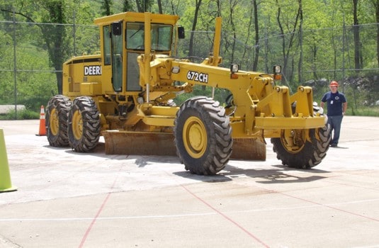 Motor Grader being placed on polar grid.