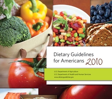 M9D collage of broccoli, blueberries, beans, tomatoes and whole grain bread on the front cover of the 2010 USDA Dietary Guidelines for Americans