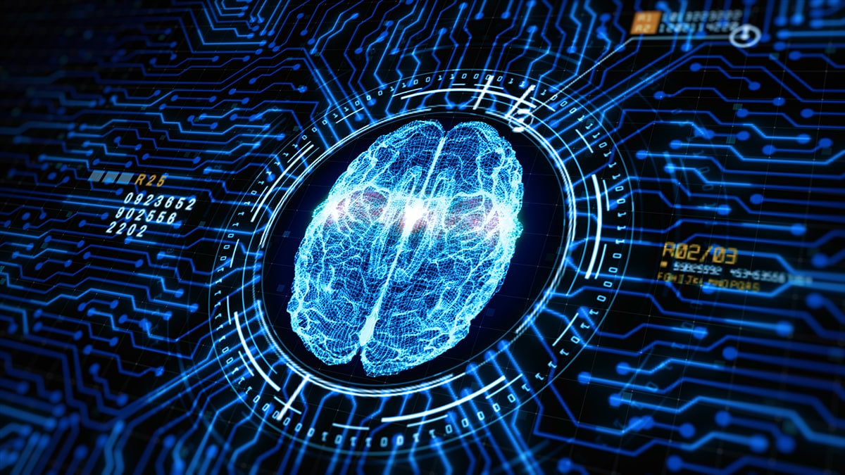 cross-cut image of brain surrounded by circuitry