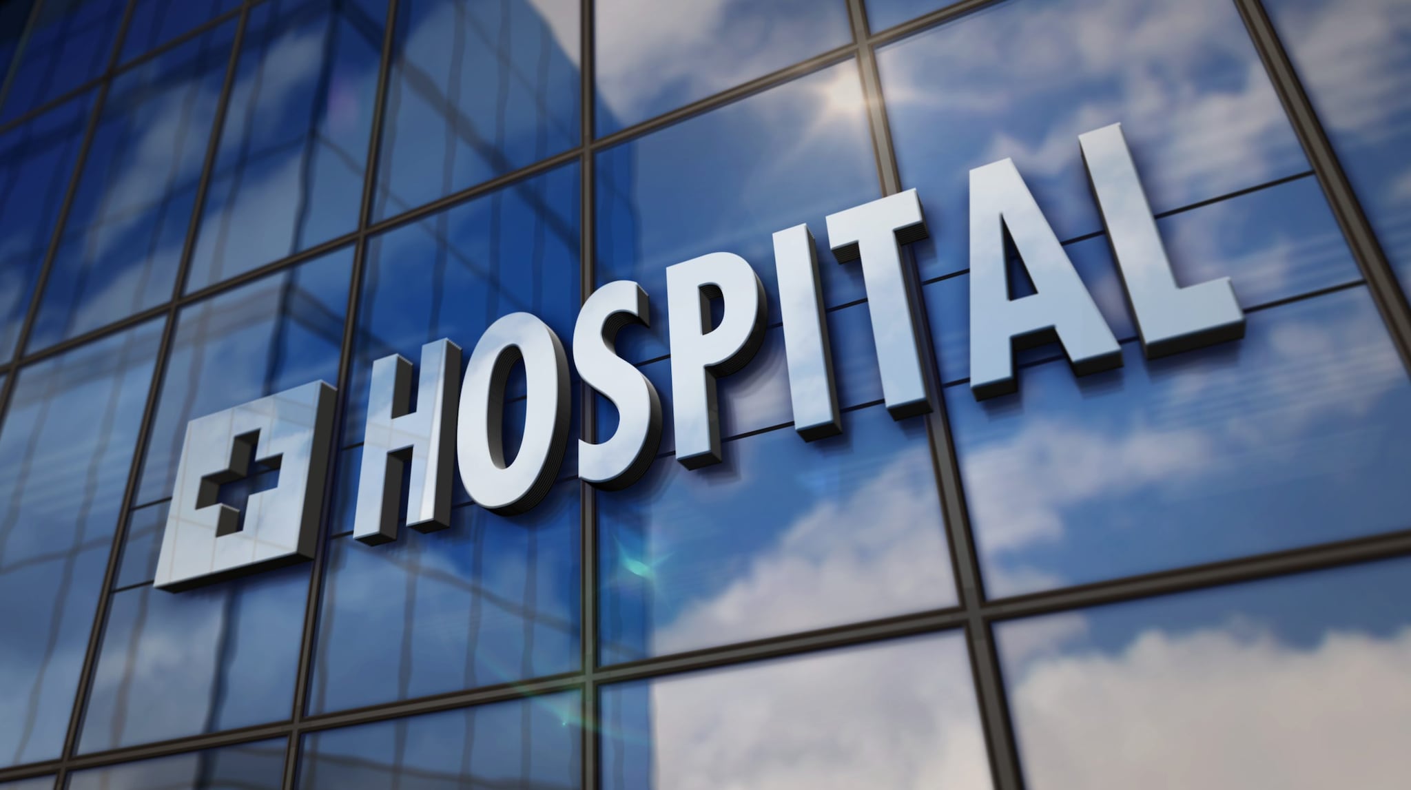 Building with hospital sign.