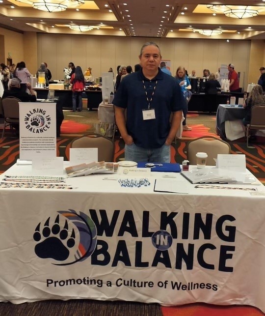 Abraham Bearpaw (Cherokee) showcases his program Walking in Balance at a health fair