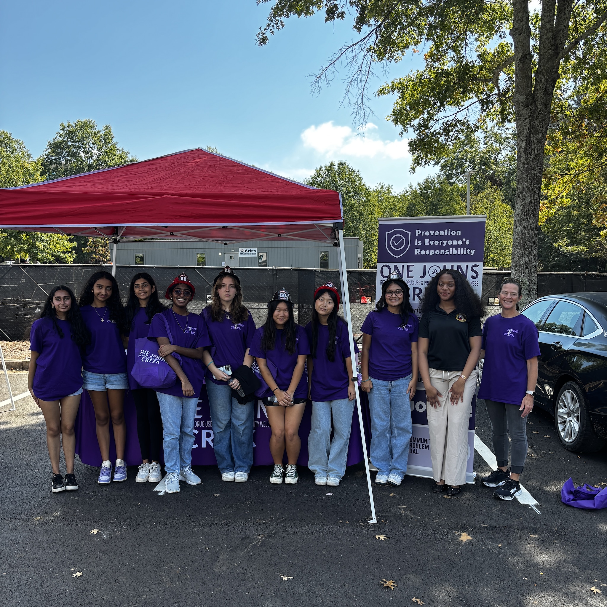 Group of diverse young women at community event