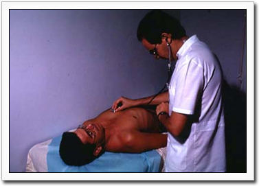 A physician carrying out an examination of the heart of a patient suffering from Chagas disease.