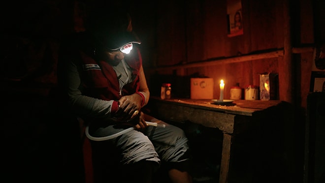 Local staff working late at night to capture mosquitoes.