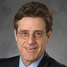 MichenerSuit.jpg Headshot of Lloyd Michener