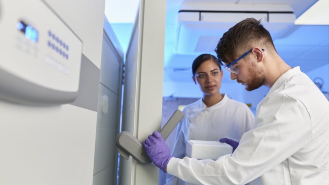 Scientists conduct experiment in laboratory