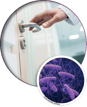 A hand touching a door handle and a close view of germs