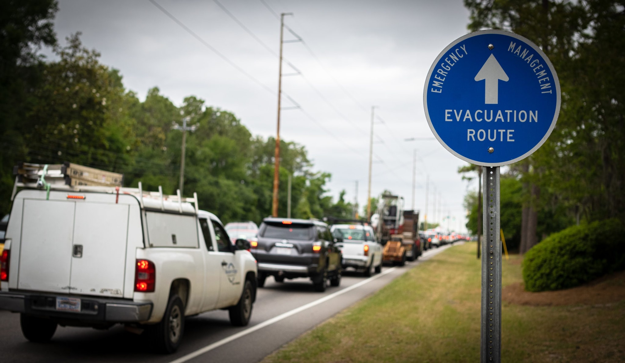 Cars on a road marked as an evacuation route