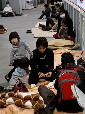 Families sheltering indoors after a radiation hazard