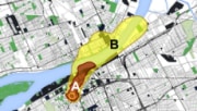 An arial view of a city map with colored circles and shapes indicating areas of blast/thermal damage and radiation exposure due to fallout.