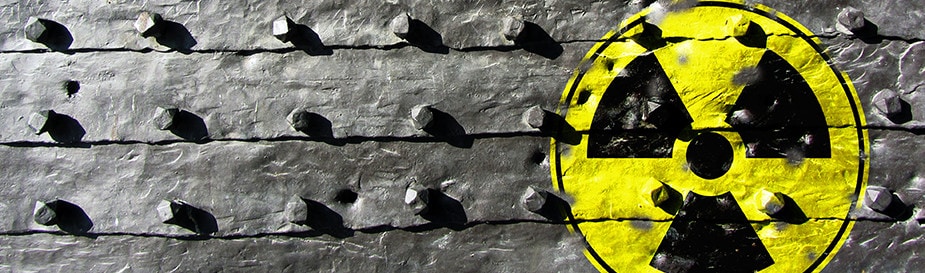 A radioactive symbol painted on a wall