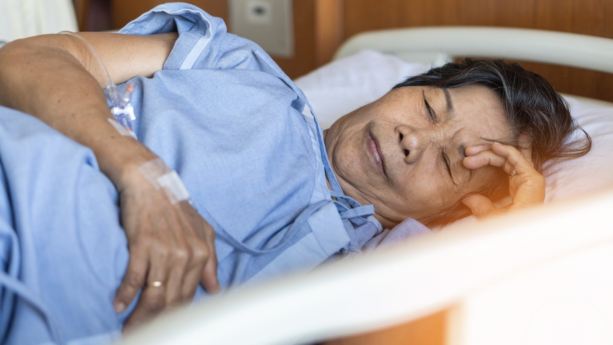 Older woman in a hospital bed