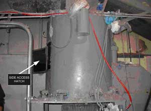 full200505e.jpg_bbe61 Side access hatch that should have been used by appropriately trained workers.