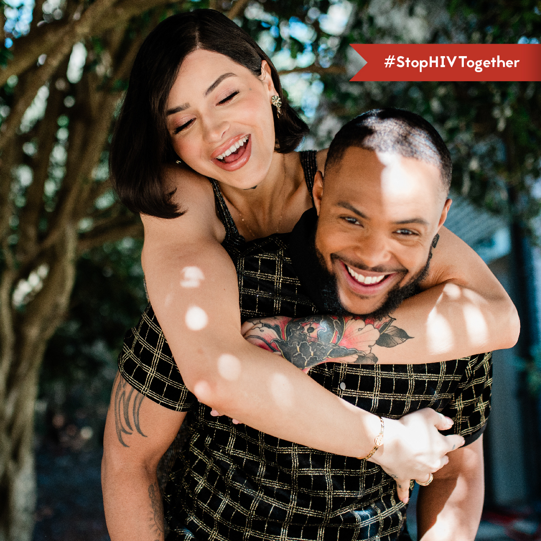 Ocean & Jamal Graphic An image of a trans woman embracing her trans masculine partner affectionately.