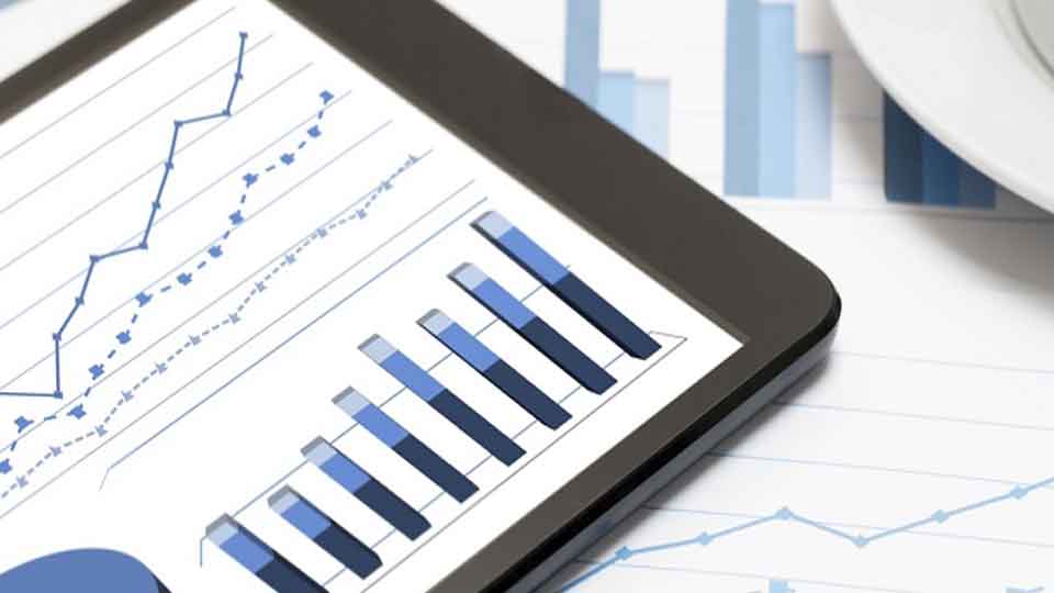 Tablet displaying line chart and bar chart