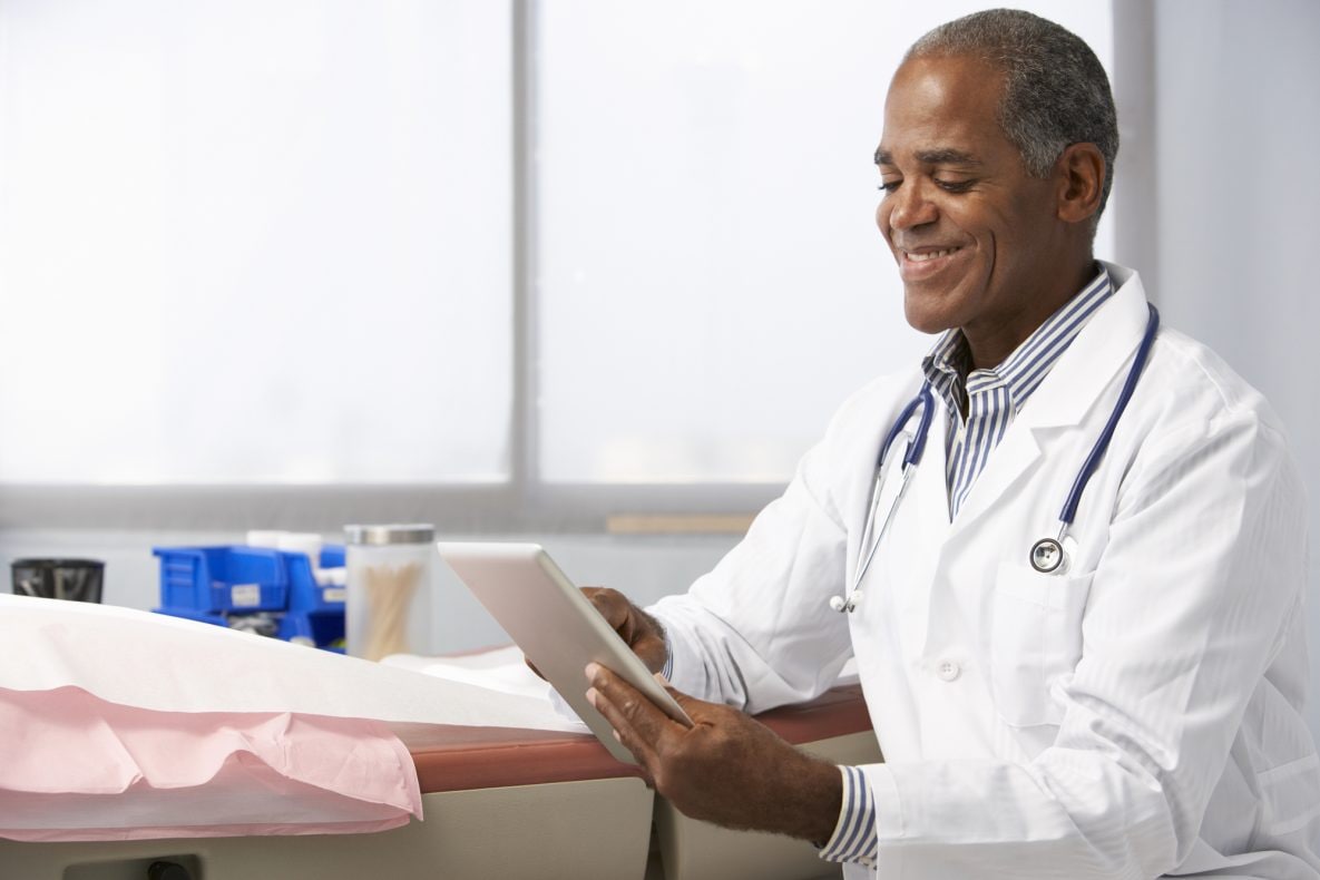 Doctor looking at a tablet