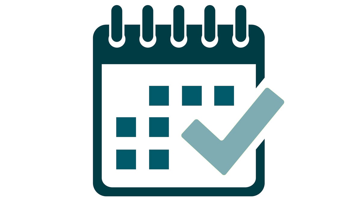 An icon of a monthly calendar with a green checkmark in the foreground