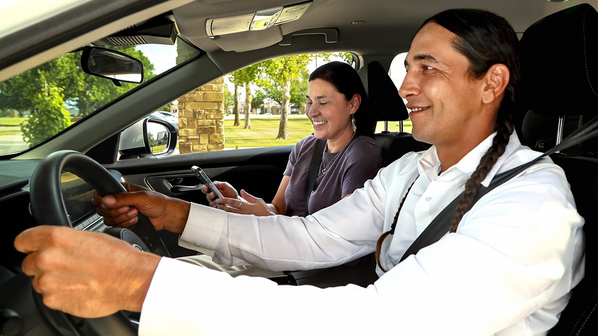 Native American couple in car