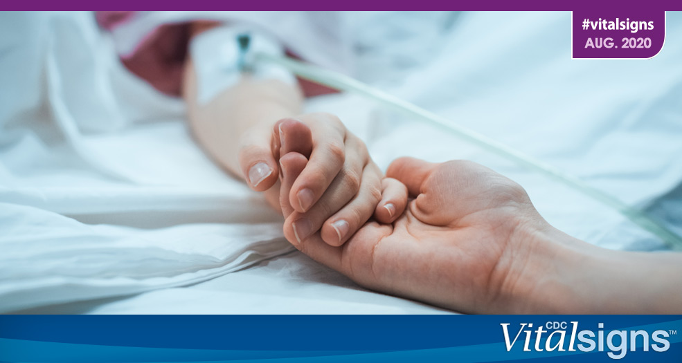 Acute Flaccid Myelitis (AFM) A person clasping the hand of a patient to comfort them.